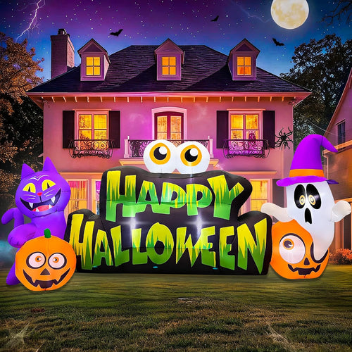 Inflatable HAPPY HALLOWEEN banner with a big-eyed pumpkin, ghost and purple cat in front of a house